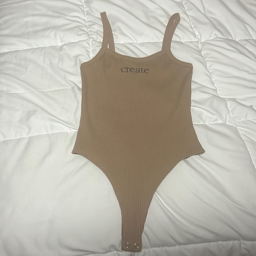 Light brown/tan body suit, unworn, small